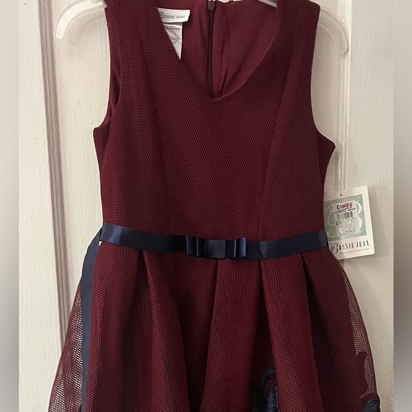 Bonnie Jean Other - Burgundy and navy blue V neck dress with bow and navy blue design at the bottom